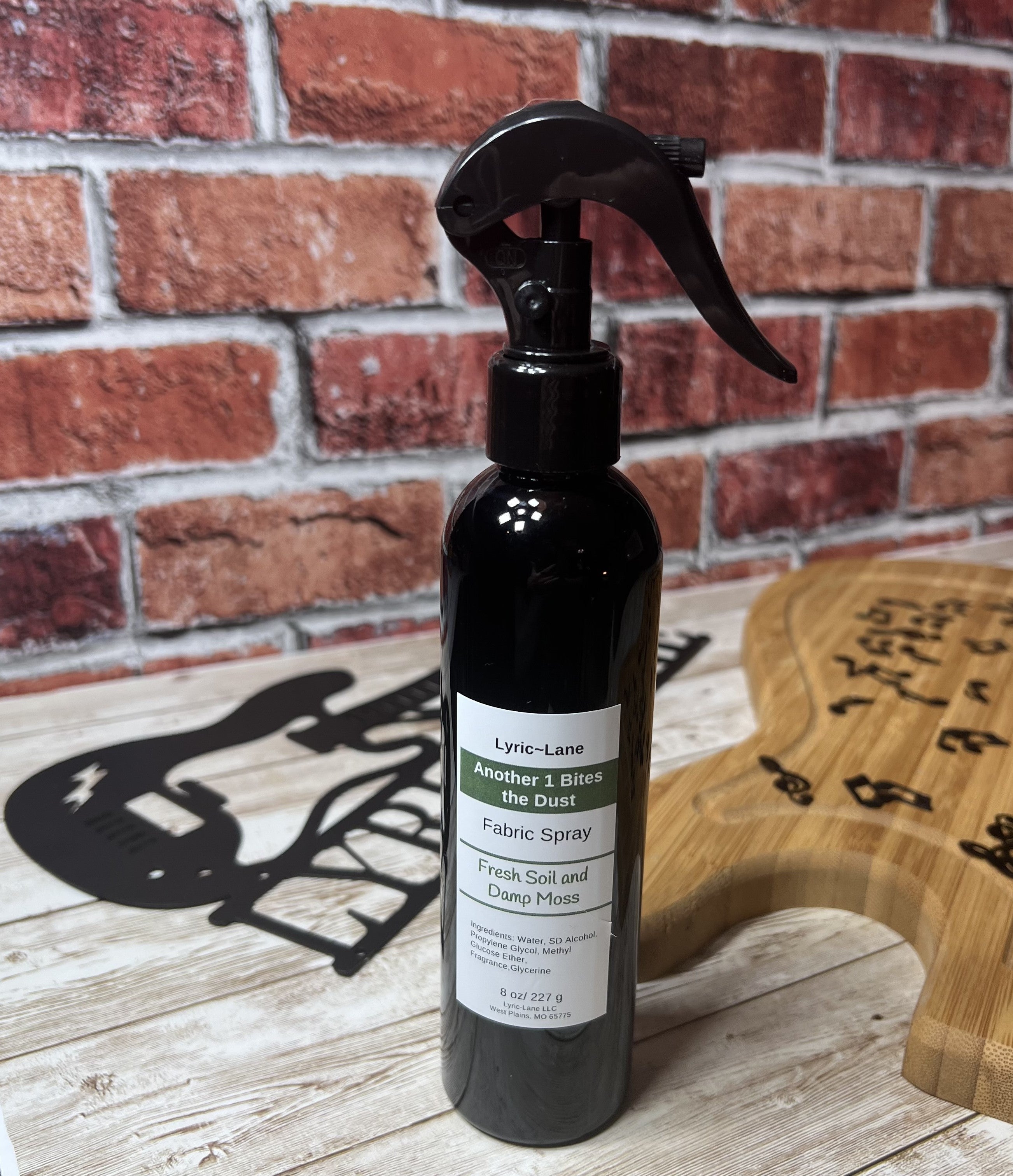 Lyric-Lane fabric spray with fresh soil and damp moss scent, Another 1 Bites the Dust - Smells Like Dirt. On Purpose.