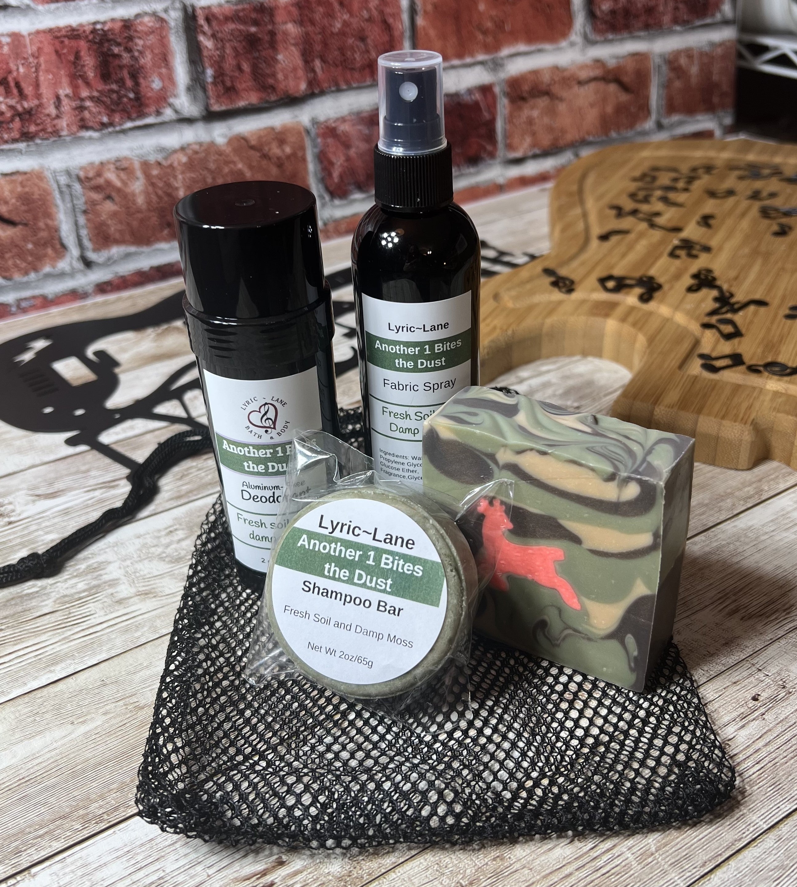 Lyric-Lane bath set with deodorant, fabric spray, and shampoo bar featuring Another 1 Bites the Dust - Smells Like Dirt. On Purpose.